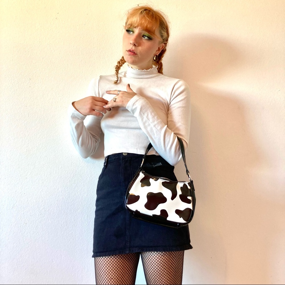 The cow print shoulder bag